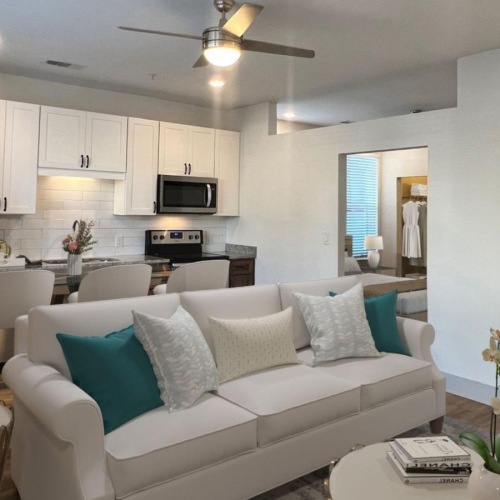 Beautiful living areas to match your lifestyle a living room with a white couch and a table