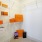 a closet with shelves and boxes