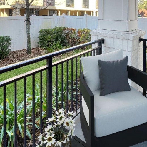 Your new home is waiting a white chair on a balcony